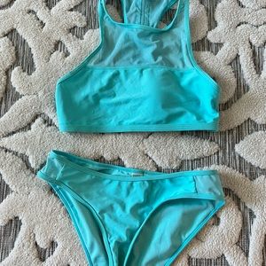 Light blue swimsuit.